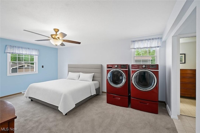 27539 Linwood Cir, North Olmsted, OH 44070 - tiled bedroom with washing machine and clothes dryer, carpet flooring, and baseboards