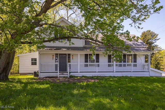 12014 Ridge Rd, North Royalton, OH 44133 - view of front of home featuring covered porch, a front yard, central AC, and roof with shingles