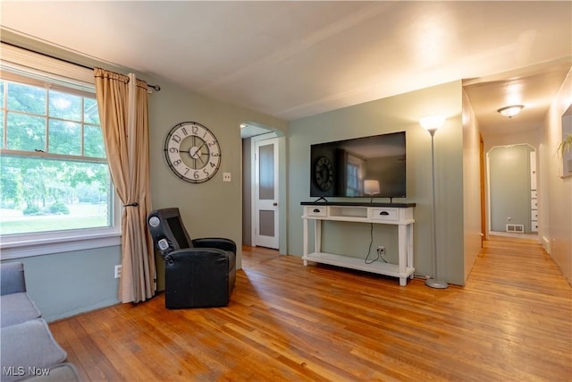 3796 Sweitzer St NW, Uniontown, OH 44685 - sitting room with light wood finished floors