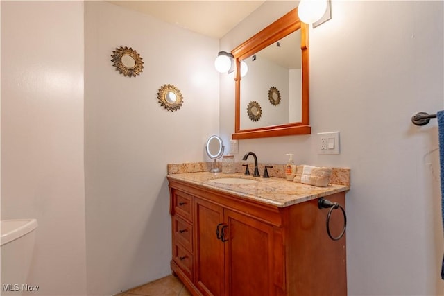 3796 Sweitzer St NW, Uniontown, OH 44685 - half bath featuring vanity, toilet, and tile patterned flooring