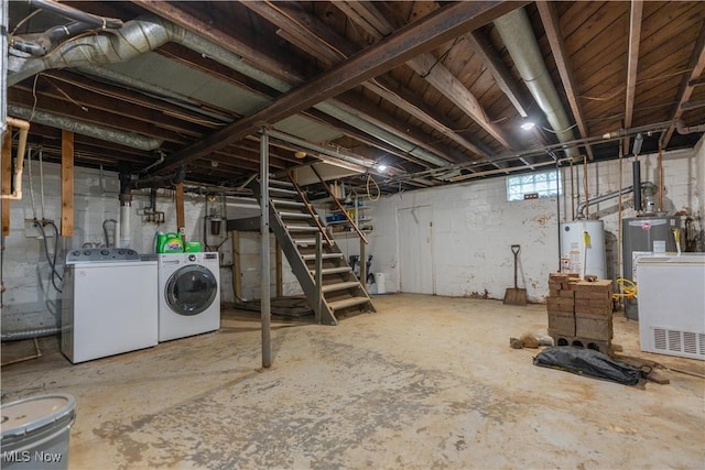 3796 Sweitzer St NW, Uniontown, OH 44685 - below grade area with washing machine and clothes dryer, stairs, and water heater