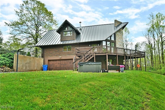 18102 Owen Rd, Middlefield, OH 44062 - back of house with a standing seam roof, a deck, a lawn, log exterior, and metal roof