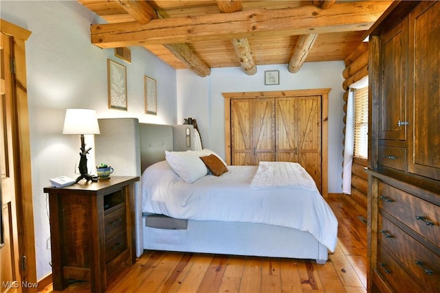 18102 Owen Rd, Middlefield, OH 44062 - bedroom with wooden ceiling with exposed beams and hardwood / wood-style flooring