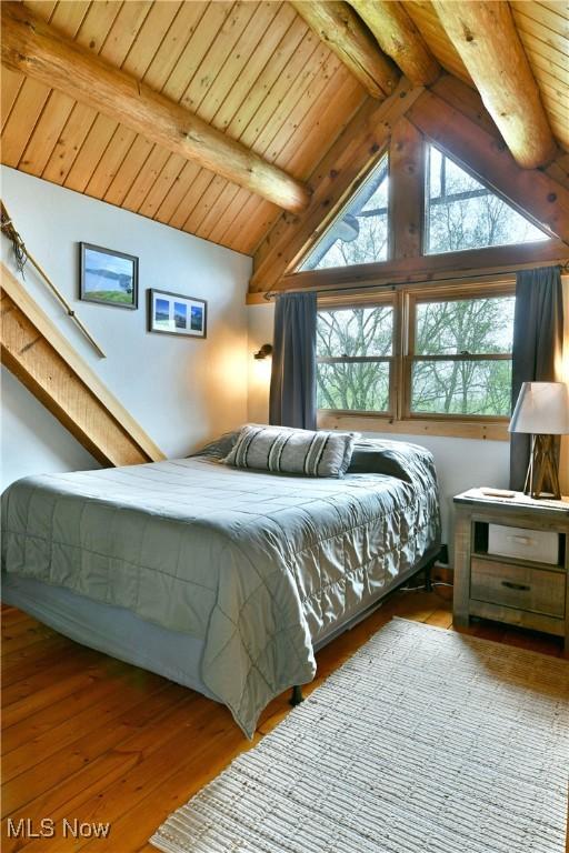 18102 Owen Rd, Middlefield, OH 44062 - bedroom with wood ceiling and wood finished floors