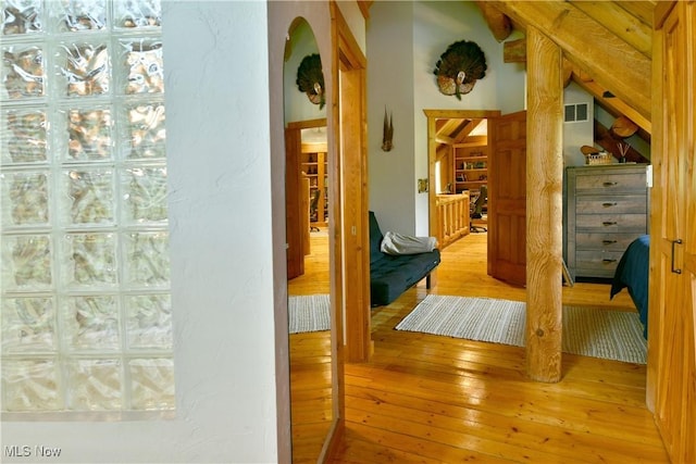 18102 Owen Rd, Middlefield, OH 44062 - corridor featuring light wood-style flooring and arched walkways