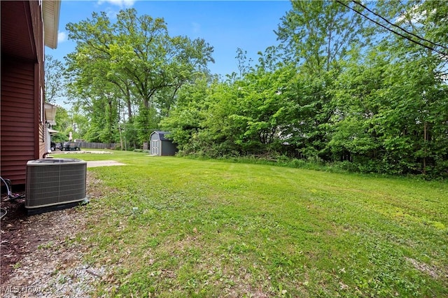 1704 Emerald Dr, Lorain, OH 44053 - view of green lawn with central air condition unit