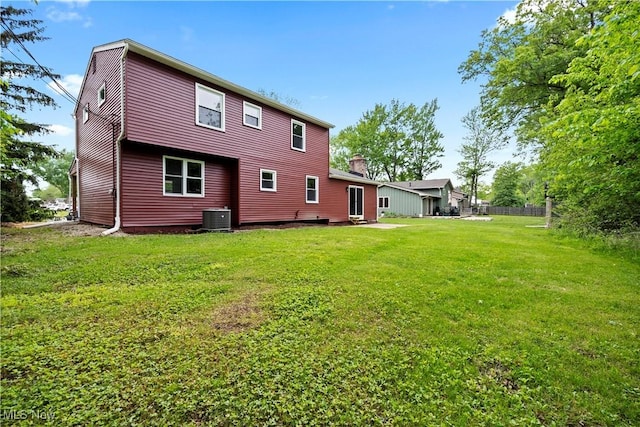 1704 Emerald Dr, Lorain, OH 44053 - back of house featuring central air condition unit