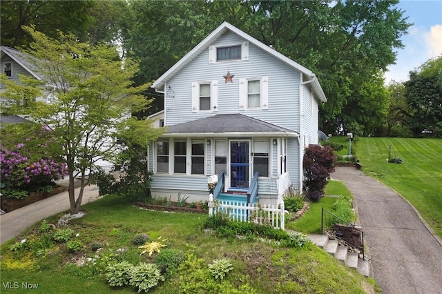 645 N Way St, Barberton, OH 44203 - view of front of home with a front yard