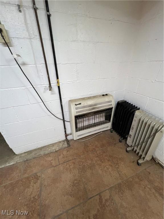 725 Logan Ave, Mingo Junction, OH 43938 - detailed view of heating unit and concrete block wall