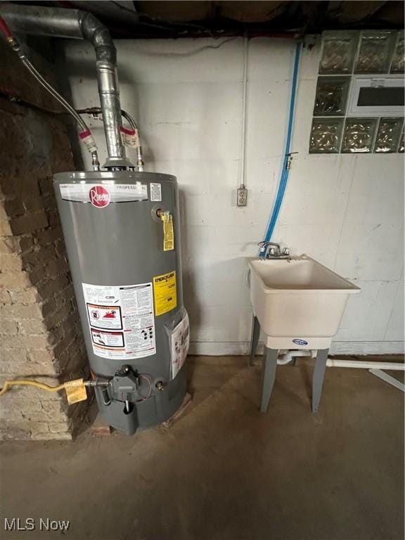 725 Logan Ave, Mingo Junction, OH 43938 - utilities with water heater and a sink