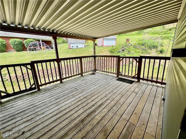 725 Logan Ave, Mingo Junction, OH 43938 - deck with an outbuilding, a playground, and a yard