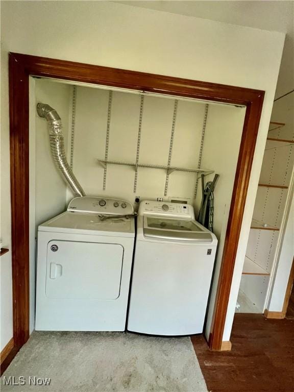 725 Logan Ave, Mingo Junction, OH 43938 - washroom featuring independent washer and dryer, wood finished floors, and baseboards