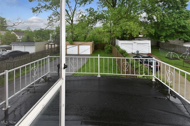 17917 Scottsdale Blvd, Shaker Heights, OH 44122 - view of patio / terrace with a garage and an outdoor structure