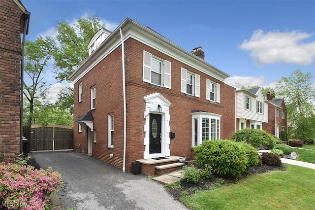 17917 Scottsdale Blvd, Shaker Heights, OH 44122 - view of front of home with brick siding and a chimney