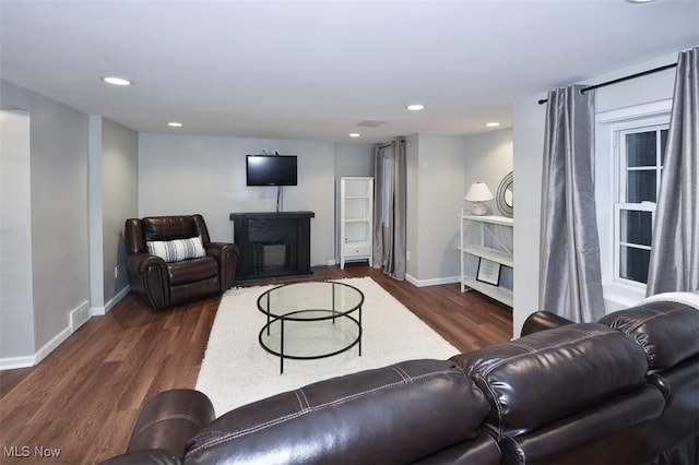17917 Scottsdale Blvd, Shaker Heights, OH 44122 - living room with wood finished floors, baseboards, recessed lighting, and a fireplace