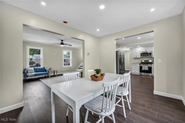 5325 Jefferson Ave, Ashtabula, OH 44004 - dining area with dark wood finished floors, baseboards, recessed lighting, stairs, and a ceiling fan