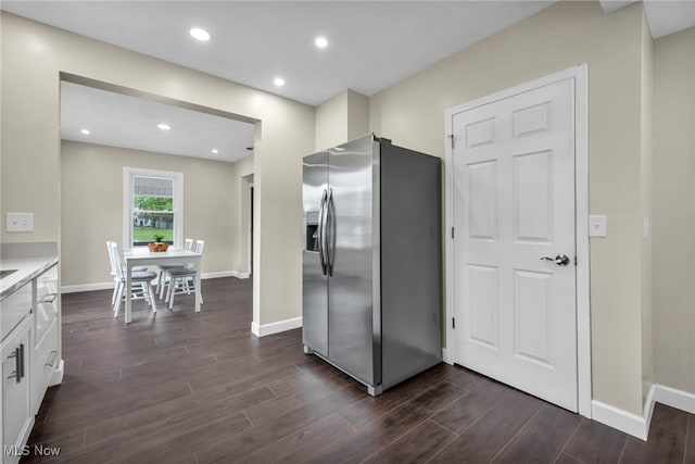 5325 Jefferson Ave, Ashtabula, OH 44004 - kitchen with stainless steel refrigerator with ice dispenser, white cabinetry, dark wood-style floors, and recessed lighting