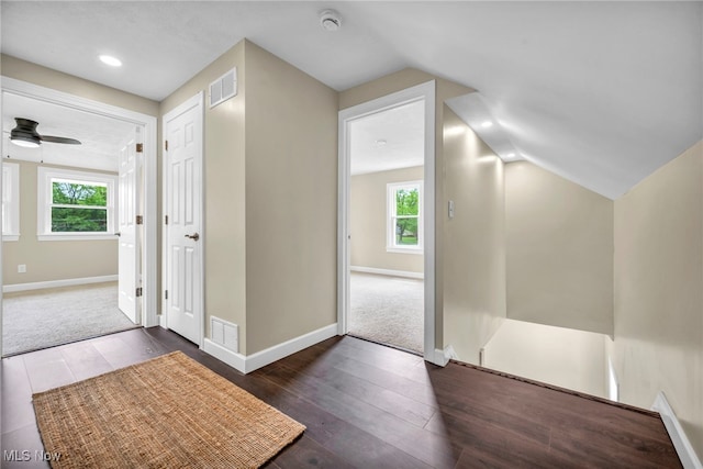 5325 Jefferson Ave, Ashtabula, OH 44004 - additional living space with vaulted ceiling, dark wood-type flooring, healthy amount of natural light, baseboards, and ceiling fan