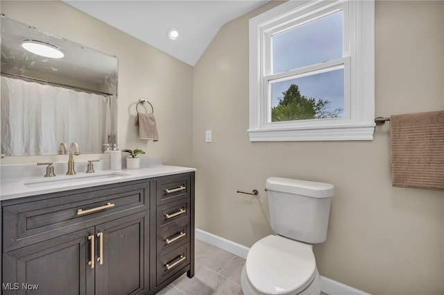 5325 Jefferson Ave, Ashtabula, OH 44004 - bathroom with toilet, vaulted ceiling, vanity, and baseboards
