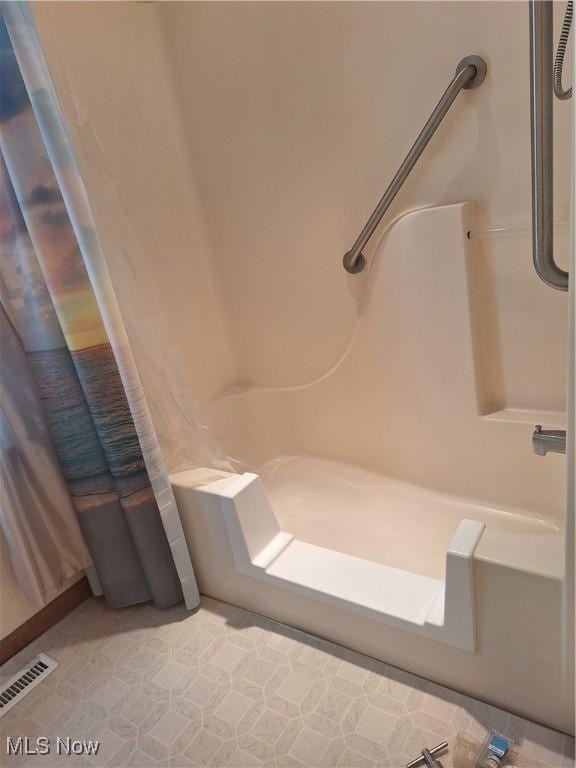 16604 Old State Rd, Middlefield, OH 44062 - full bathroom featuring a shower with curtain