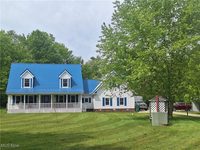 16604 Old State Rd, Middlefield, OH 44062 - view of front of house with a porch, a front lawn, and metal roof