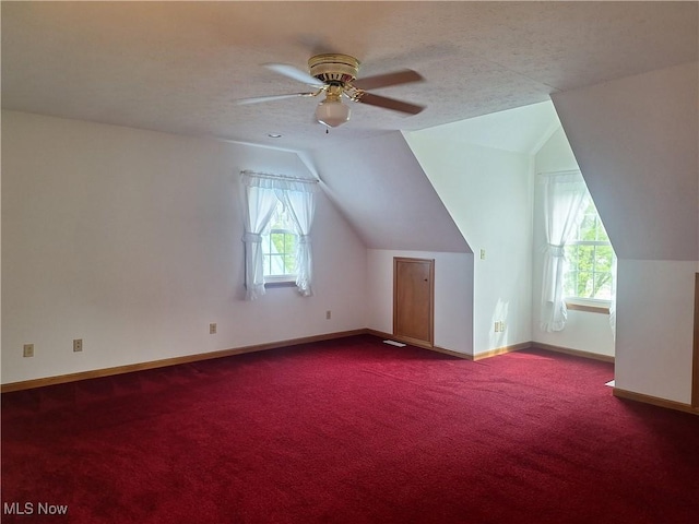 16604 Old State Rd, Middlefield, OH 44062 - bonus room featuring plenty of natural light, carpet, baseboards, a ceiling fan, and lofted ceiling