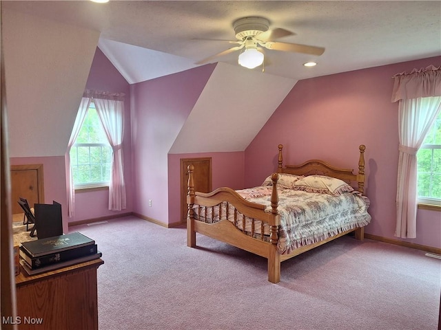 16604 Old State Rd, Middlefield, OH 44062 - bedroom with carpet flooring, multiple windows, lofted ceiling, baseboards, and ceiling fan