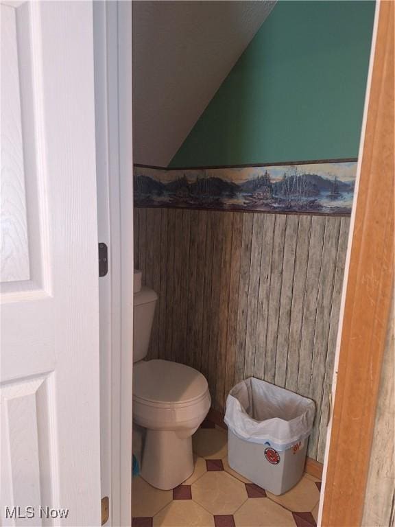 16604 Old State Rd, Middlefield, OH 44062 - bathroom featuring vaulted ceiling and toilet