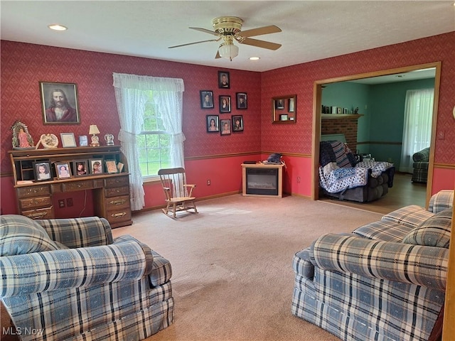 16604 Old State Rd, Middlefield, OH 44062 - living area with wallpapered walls, ceiling fan, and carpet floors