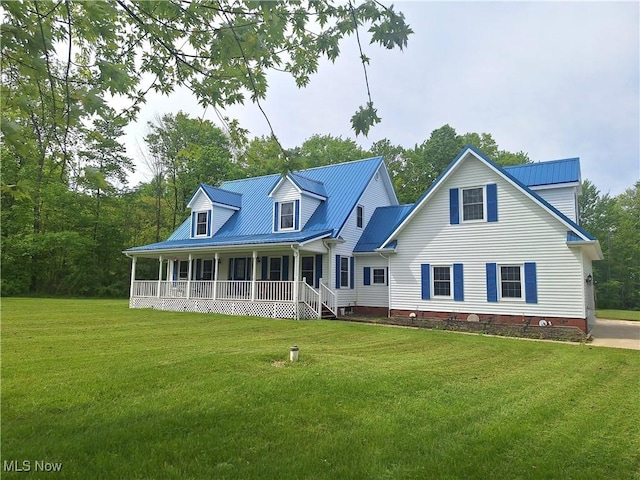 16604 Old State Rd, Middlefield, OH 44062 - view of front of house with covered porch, metal roof, and a front yard
