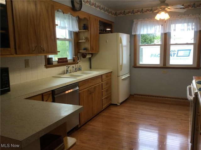 1009 Township Rd Unit 2156, Ashland, OH 44805 - kitchen featuring healthy amount of natural light, stainless steel dishwasher, light wood-style flooring, and open shelves