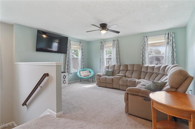 2562 Gianni Way, Richfield, OH 44286 - living room featuring carpet flooring, a ceiling fan, and baseboards