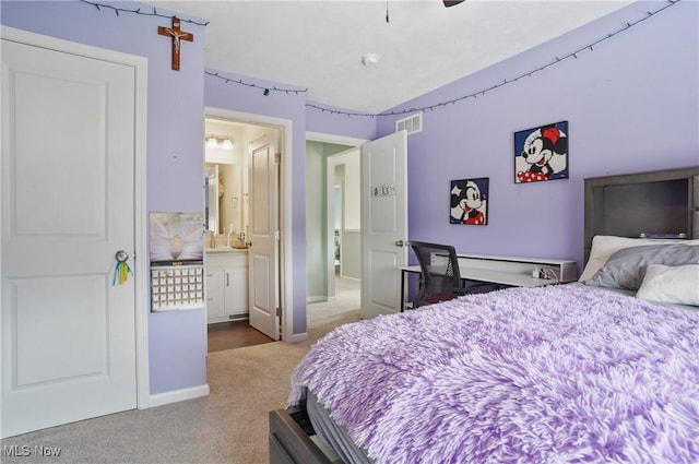 2562 Gianni Way, Richfield, OH 44286 - carpeted bedroom with ensuite bathroom and baseboards