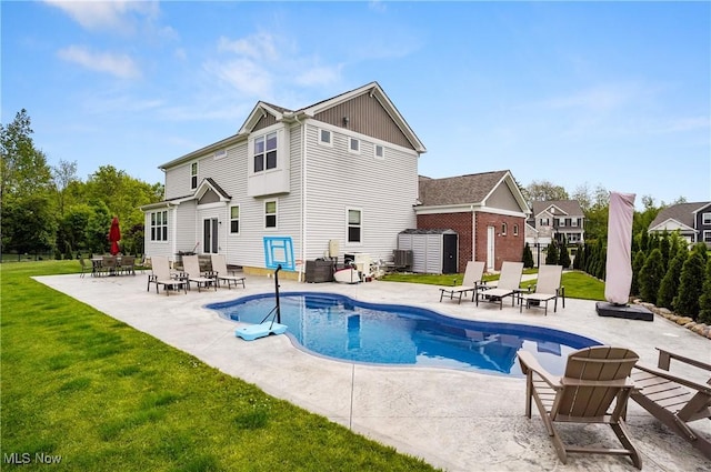 2562 Gianni Way, Richfield, OH 44286 - view of swimming pool featuring a patio area, a yard, and central air condition unit