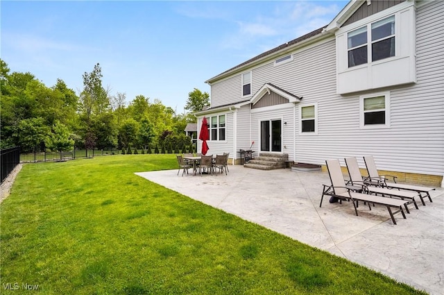 2562 Gianni Way, Richfield, OH 44286 - rear view of property featuring entry steps, board and batten siding, and a patio