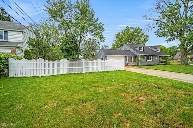 2039 S Green Rd, South Euclid, OH 44121 - view of yard with concrete driveway and an attached garage