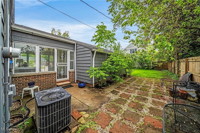 2039 S Green Rd, South Euclid, OH 44121 - fenced backyard with cooling unit and a patio area