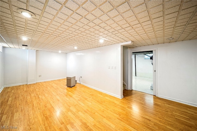 2039 S Green Rd, South Euclid, OH 44121 - finished basement with wood finished floors, baseboards, and stairs
