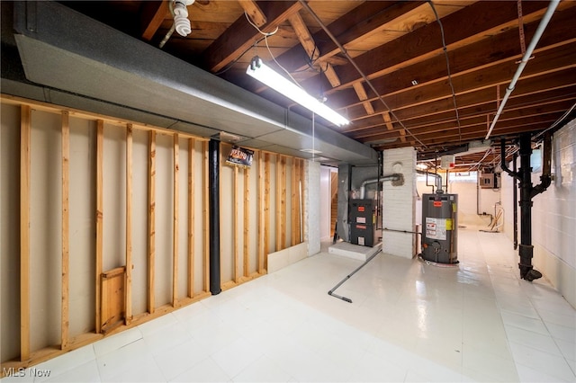 2039 S Green Rd, South Euclid, OH 44121 - unfinished basement with water heater, heating unit, and tile patterned floors