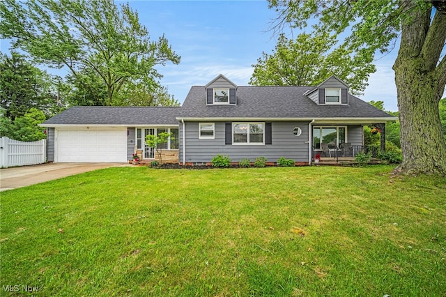 2039 S Green Rd, South Euclid, OH 44121 - cape cod-style house with concrete driveway, an attached garage, and roof with shingles