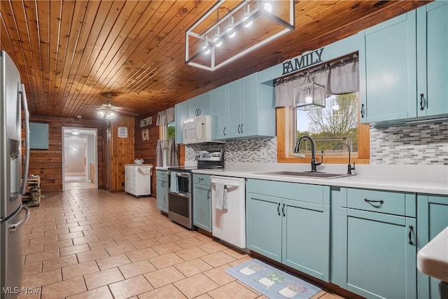 9434 Trinity Church Rd, Lisbon, OH 44432 - kitchen featuring appliances with stainless steel finishes, decorative backsplash, wooden ceiling, light countertops, and a sink