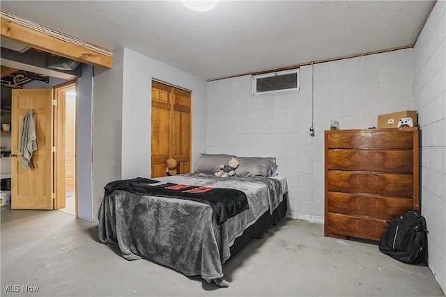 9434 Trinity Church Rd, Lisbon, OH 44432 - bedroom with concrete flooring and concrete block wall