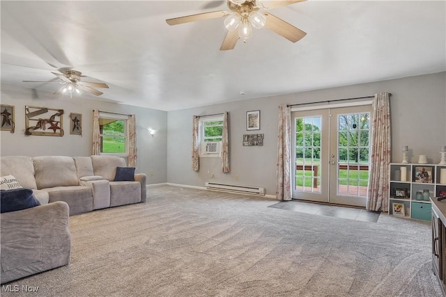 9434 Trinity Church Rd, Lisbon, OH 44432 - living room with ceiling fan, a baseboard radiator, french doors, and carpet flooring