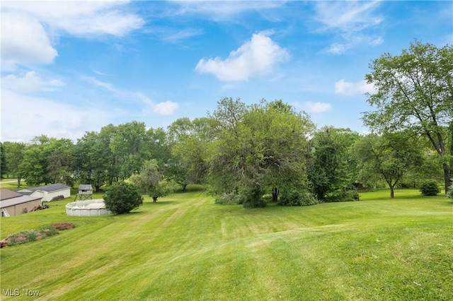 4426 Dueber Ave SW, Canton, OH 44706 - view of grassy yard featuring view of scattered trees