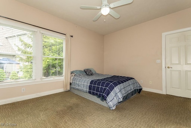83 Haskell Dr, Bratenahl, OH 44108 - carpeted bedroom with baseboards and a ceiling fan