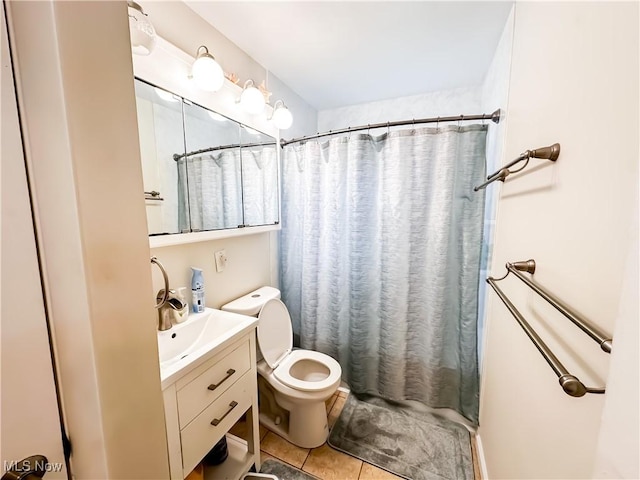 2007 W 59th St, Ashtabula, OH 44004 - full bath featuring vanity, tile patterned floors, toilet, and a shower with shower curtain
