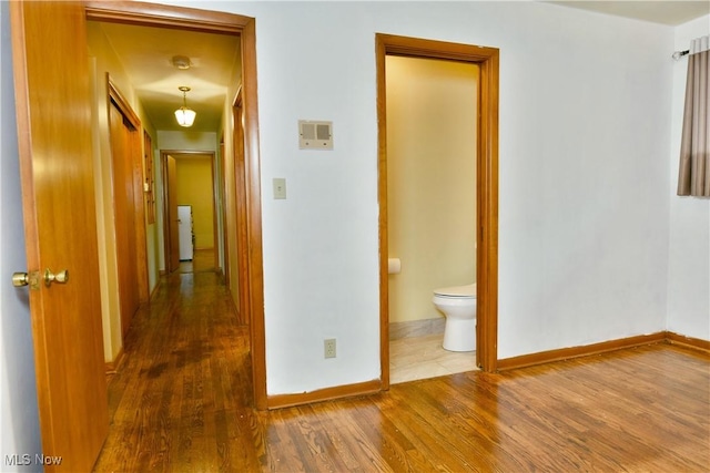 138 Mill Creek Rd, Niles, OH 44446 - corridor featuring wood finished floors and baseboards