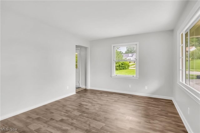3304 Tangent St, Youngstown, OH 44502 - spare room featuring healthy amount of natural light, wood finished floors, and baseboards