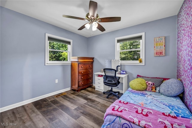 13014 Cherry Ln, Chesterland, OH 44026 - bedroom featuring dark wood-type flooring, ceiling fan, and baseboards