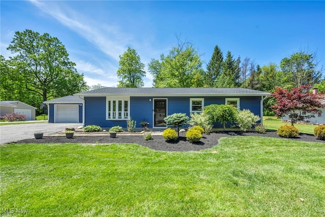 13014 Cherry Ln, Chesterland, OH 44026 - single story home featuring a garage and a front yard